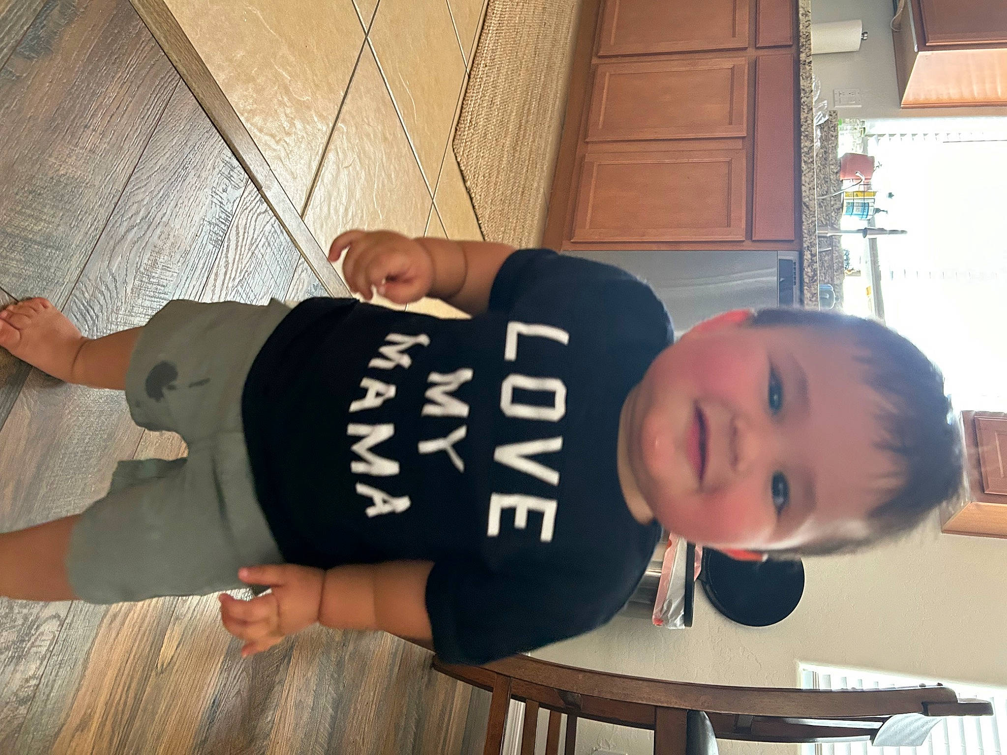 Lux joined the competition — help win amazing prizes! elbow, flooring, gesture, hand, hardwood, hat, joy, knee, person, room, sleeve, t_shirt, table, thumb, toddler, varnish, wood, wrist