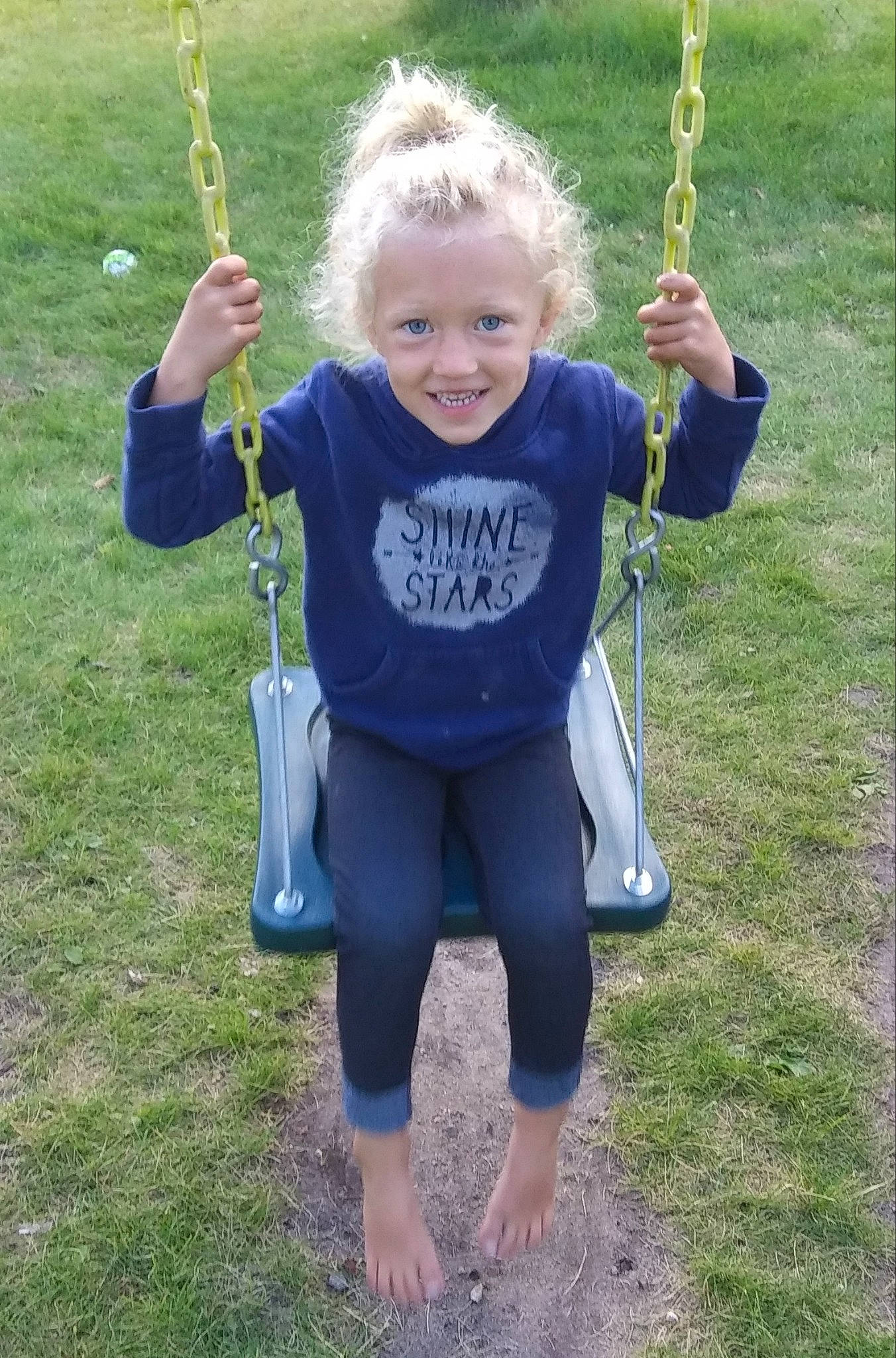 Alaina joined the competition — help win amazing prizes! child, joy, outdoor_play_equipment, person, play, playground, public_space, recreation, smile, swing, toddler
