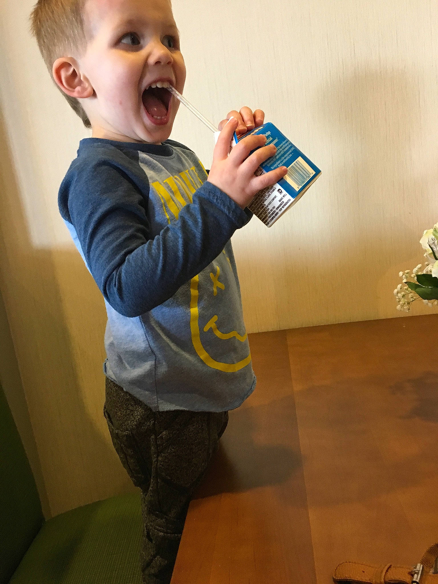 Finnley is registered to the contest to win money with this photo: baby, child, floor, flooring, nose, person, play, smile, standing, t_shirt, toddler