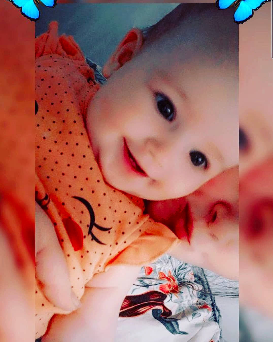 Romina participe au concours pour gagner de l'argent avec cette photo : baby, baby_toddler_clothing, blue, cheek, chin, cool, eyebrow, eyelash, happy, human, iris, lip, mouth, nose, person, photograph, pink, skin, sleeve, smile