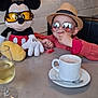 Kilian a rejoint le concours — aidez-le/la à gagner de superbes lots ! casual, child, cup, cute, funny, glass, hat, hot_chocolate, indoor, mickey_mouse, painting, plush_toy, red_sweater, reflection, restaurant, spoon, sunglasses, table, wine, wooden_wall