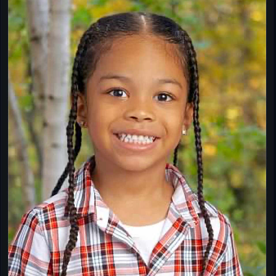 Emiaj-Prince is registered to the contest to win money with this photo: blackhair, bodypart, braid, child, clothing, face, female, girl, hair, happy, head, mouth, outdoors, person, photography, portrait, shirt, shoulder, smile, teeth