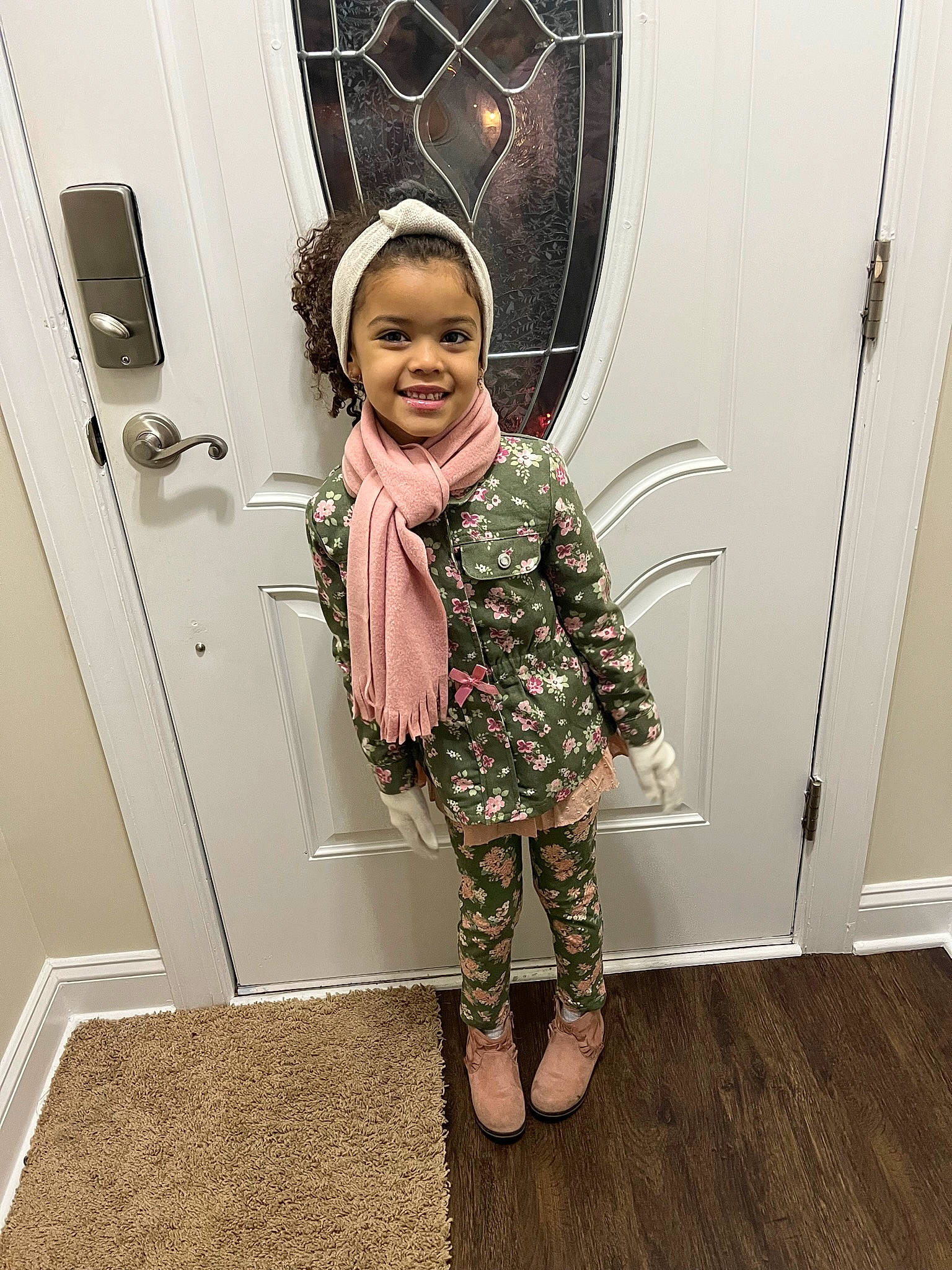Bianca joined the competition — help win amazing prizes! baby_toddler_clothing, boot, child, door, fashion_design, floor, flooring, fun, happy, human_leg, joy, magenta, pattern, person, room, sleeve, smile, snapshot, standing, toddler