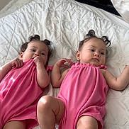Anahi And Areli joined the competition — help win amazing prizes! baby, babies, child, infant, twin, pink_clothing, bed, blanket, quilt, curly_hair, lying_down, indoors, cute, adorable, two_children, soft_light, skin, chubby_legs, young_child, peaceful