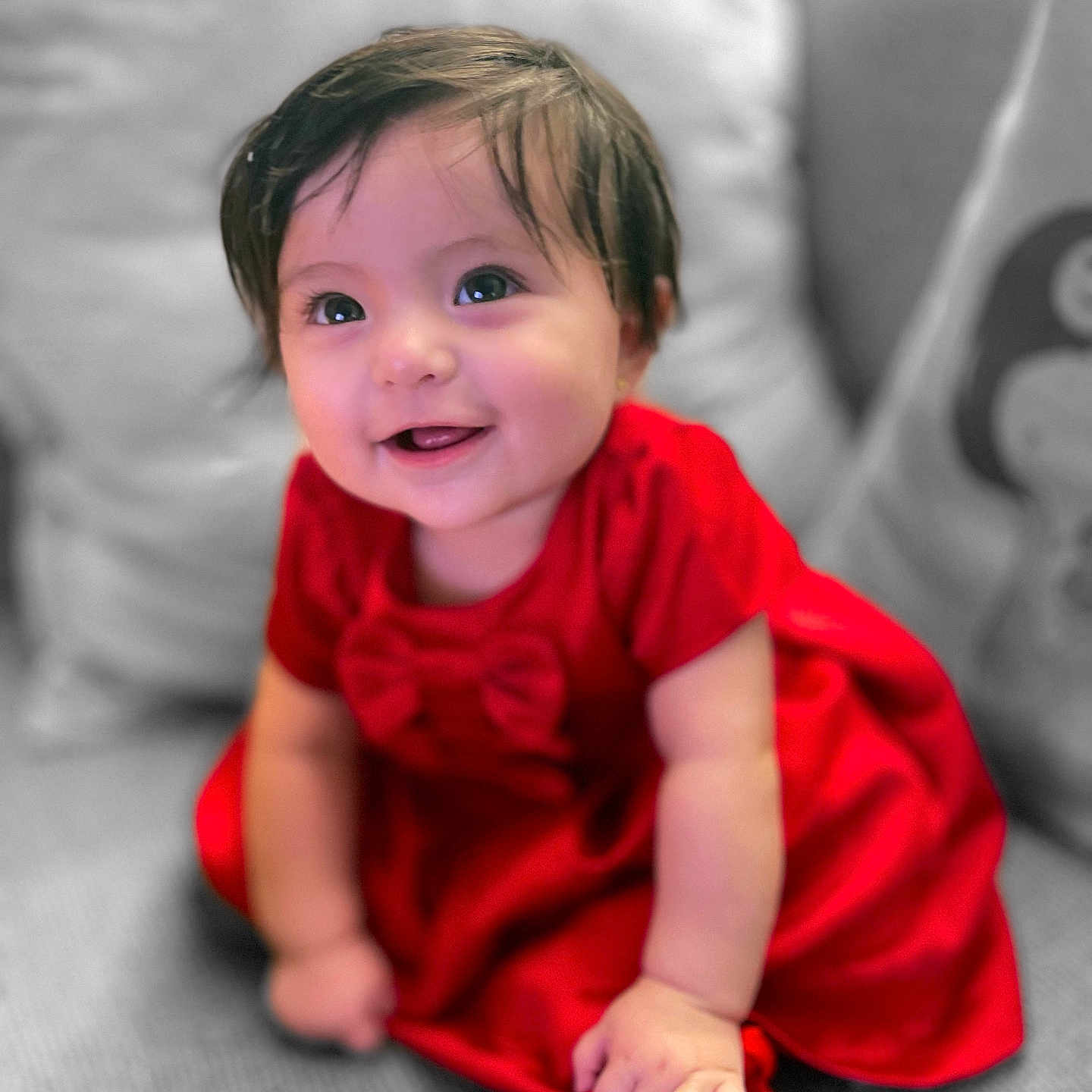 Scarlett joined the competition — help win amazing prizes! baby, bodypart, clothing, couch, cushion, dress, face, finger, formalwear, furniture, hand, happy, head, homedecor, indoors, person, photography, portrait, sitting, smile