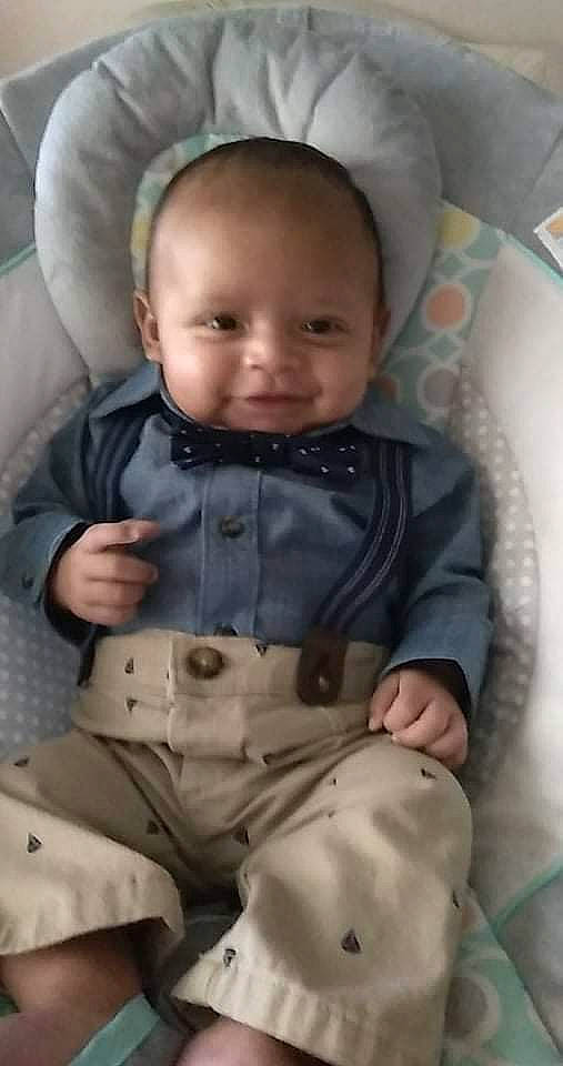 Da'Von joined the competition — help win amazing prizes! arm, baby, baby_toddler_clothing, cheek, chin, comfort, finger, gesture, hand, head, human_body, joy, mammal, nose, outerwear, person, product, skin, sleeve, smile