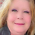 Elaine W.