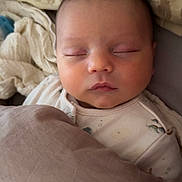 Eren participe au concours pour gagner de l'argent avec cette photo : baby, sleeping, blanket, pillow, bed, child, face, peaceful, infant, cozy, soft, resting, closeup, indoors, cute, young, portrait, comfort, relaxation, newborn