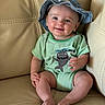 Luke Conrad Witte is registered to the contest to win money with this photo: baby, baby_clothes, child, couch, cute, denim, face, foot, green_clothing, hand, happy, hat, indoor, infant, leather, onesie, portrait, sitting, skin, smile