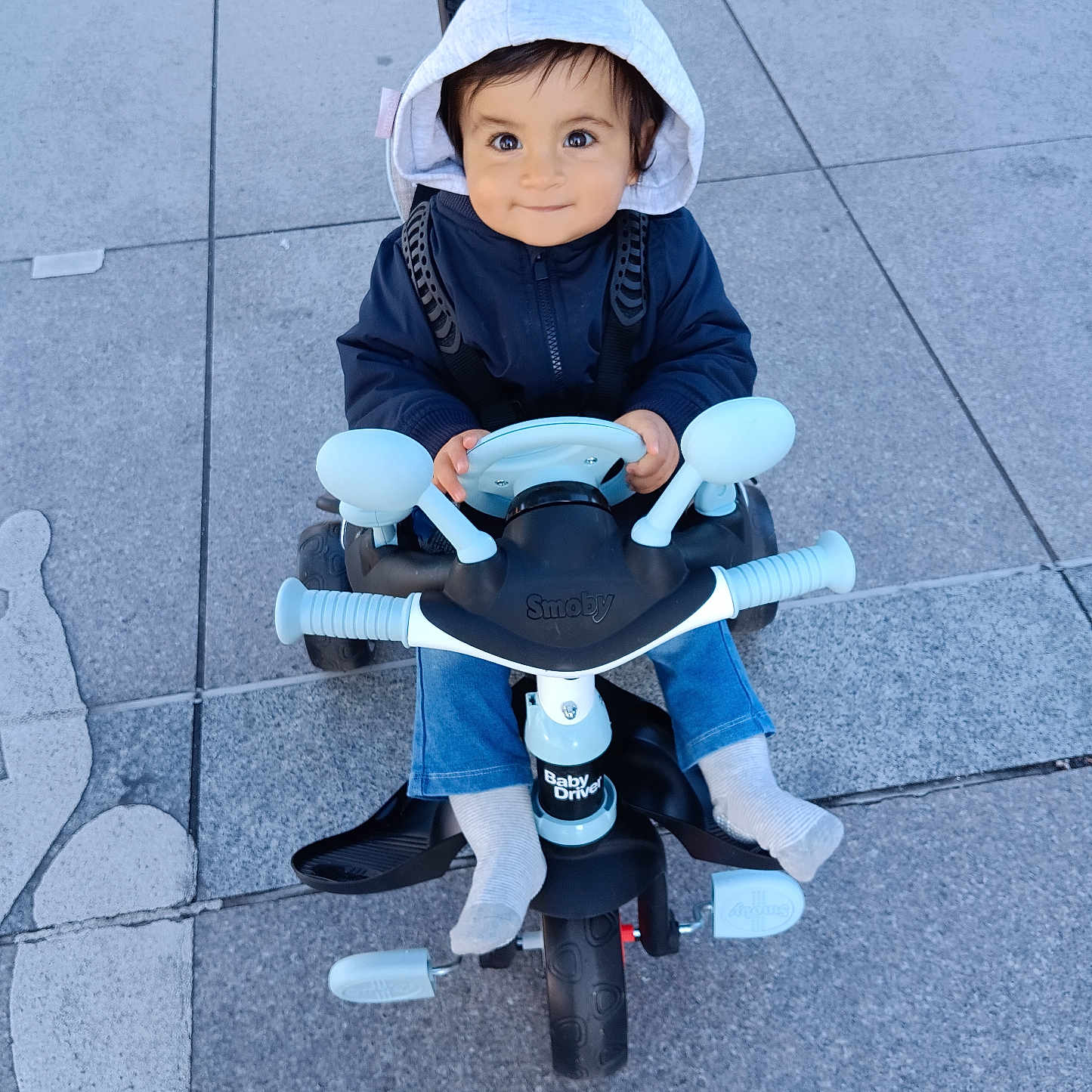 Ilyes a rejoint le concours — aidez-le/la à gagner de superbes lots ! boy, child, clothing, face, hat, head, hood, hoodie, hosiery, machine, male, motorcycle, pants, path, person, sock, transportation, vehicle, walkway, wheel