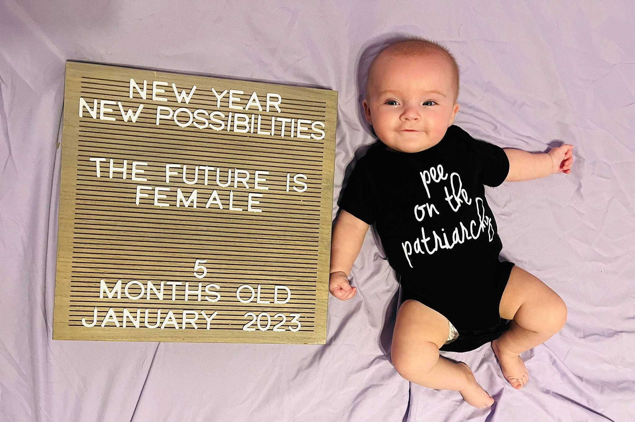Scarlett is registered to the contest to win money with this photo: baby, baby_toddler_clothing, child, comfort, elbow, finger, flash_photography, font, fun, happy, human_leg, joint, joy, knee, leg, person, sitting, sleeve, smile, t_shirt