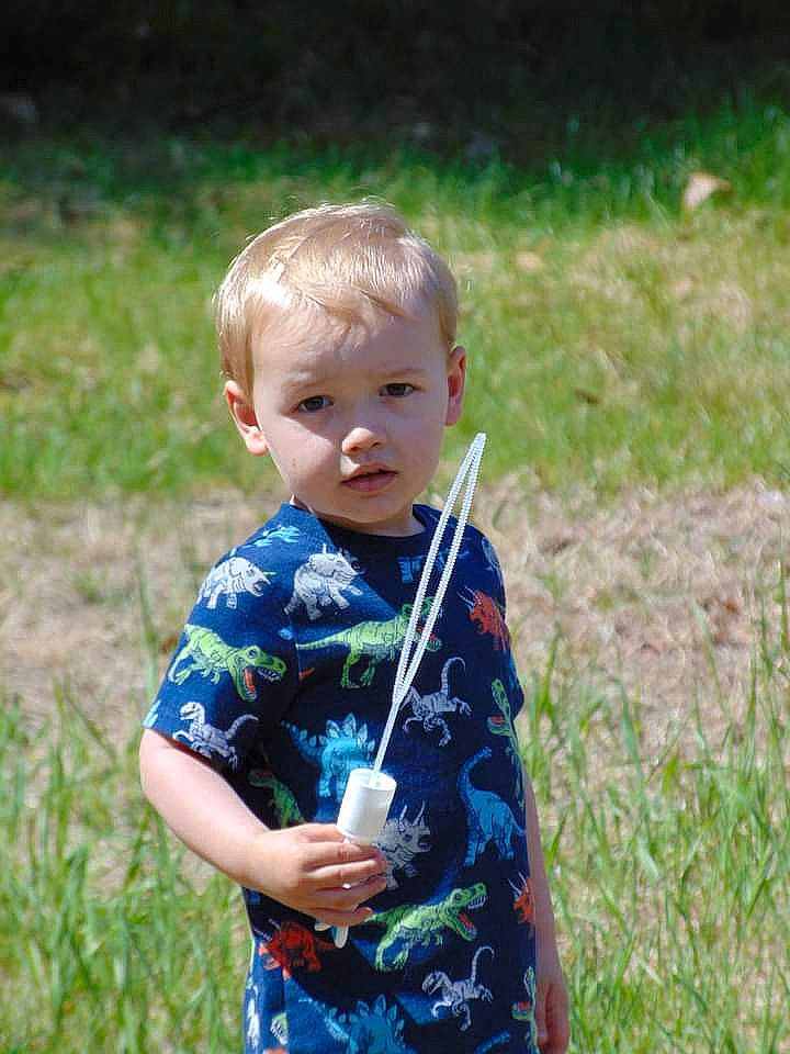 Oakley joined the competition — help win amazing prizes! baby_toddler_clothing, child, eye, face, gesture, grass, grassland, hair, happy, human_body, iris, lawn, leisure, meadow, people_in_nature, person, plant, recreation, sleeve, toddler