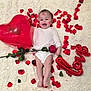Léon a rejoint le concours — aidez-le/la à gagner de superbes lots ! baby, infant, smiling, red_rose, rose_petals, heart_balloon, white_background, fluffy_blanket, valentines_day, face_paint, happy, cute, lying_down, love, holiday, celebration, red_color, skin, person, portrait