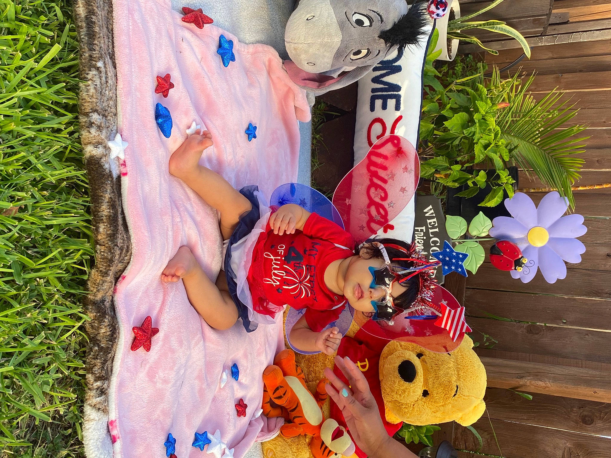 Madison is registered to the contest to win money with this photo: child, costume, event, flower, fun, grass, happy, hat, holiday, leisure, party_supply, pattern, person, plant, recreation, textile, toy, tradition, tree