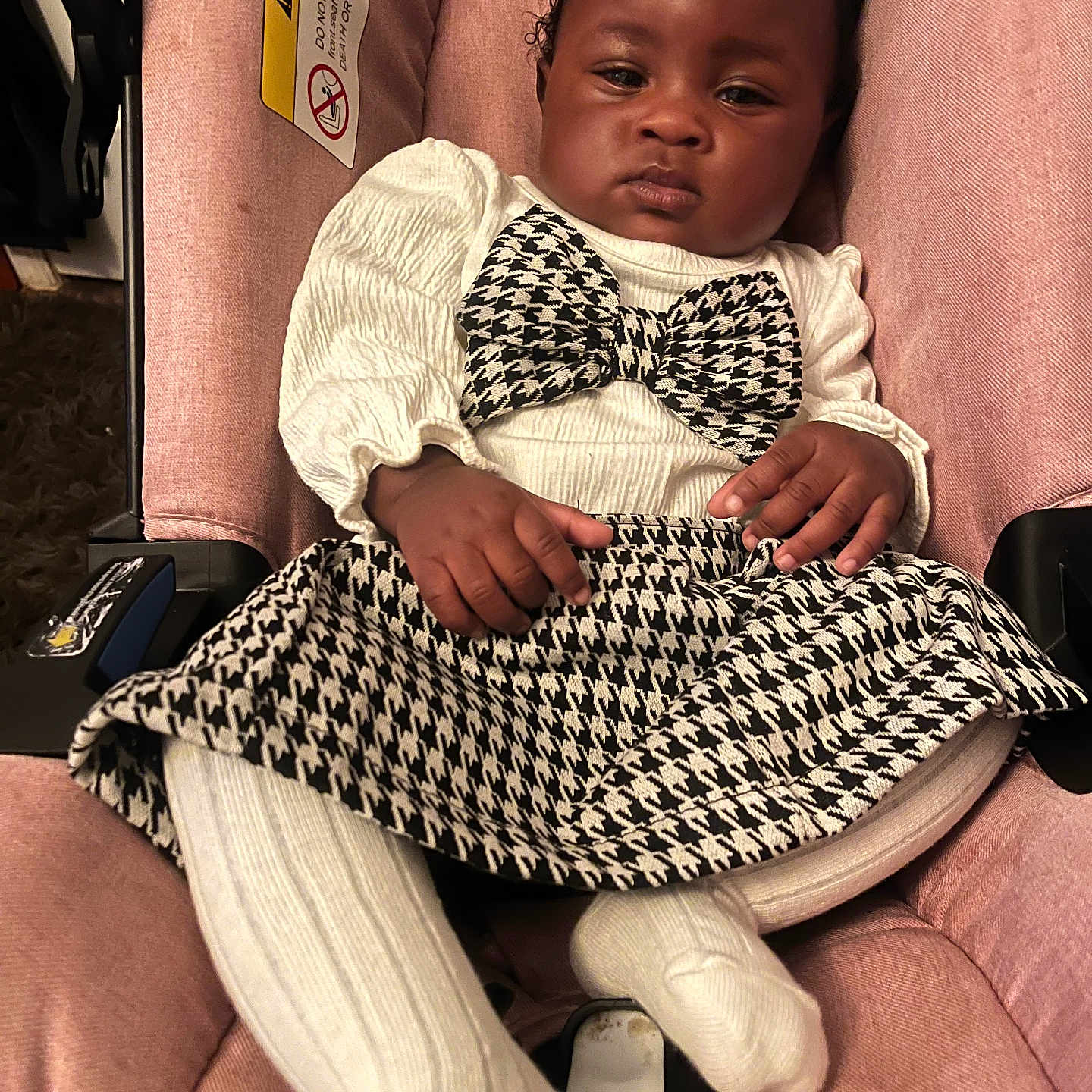 Deliyah joined the competition — help win amazing prizes! baby, baby_clothes, car_seat, child, clothing, cute, expression, fashion, footwear, hand, headband, houndstooth, indoor, infant, person, pink, portrait, seat, white_tights, young_child