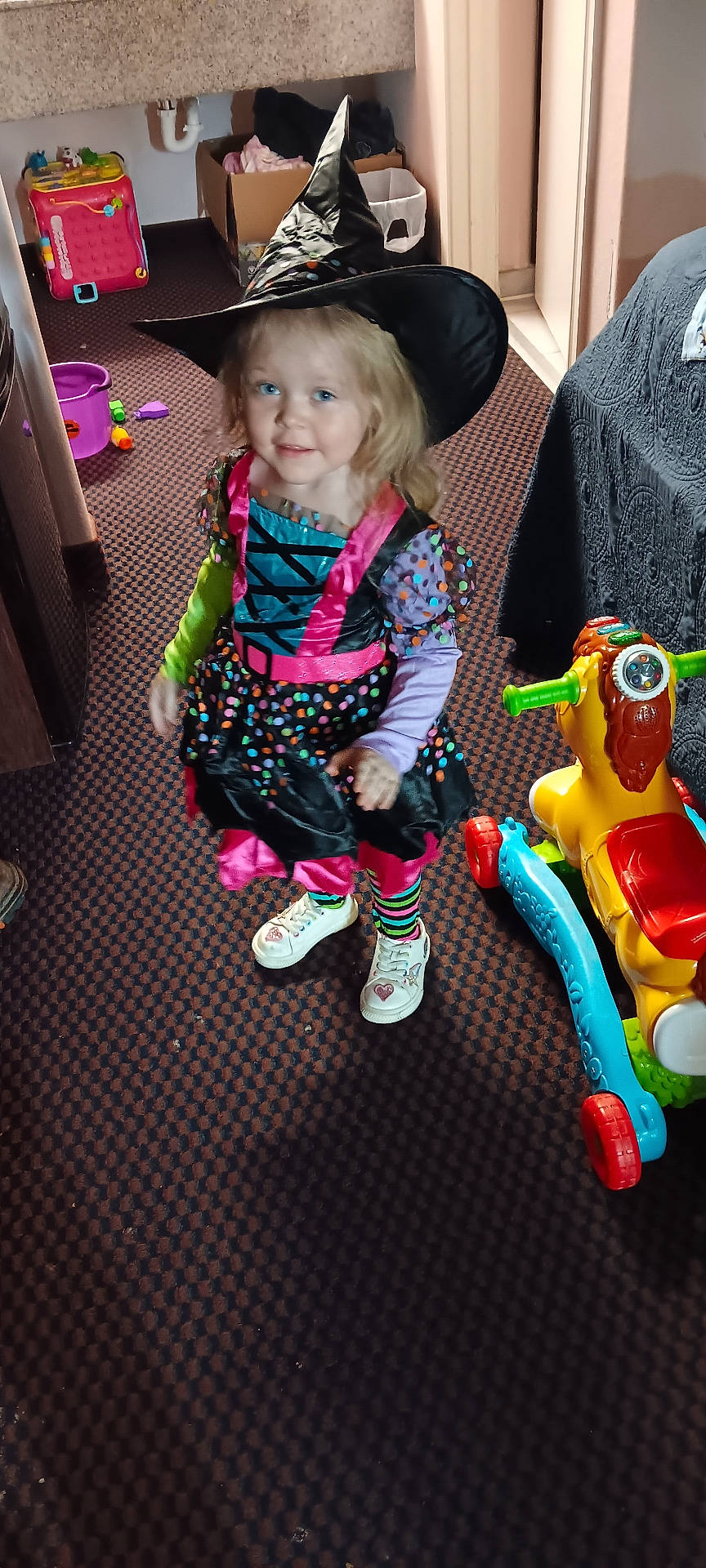 Isabella is registered to the contest to win money with this photo: accessories, adult, bag, box, child, clothing, couch, face, female, footwear, furniture, girl, handbag, hat, head, person, photography, portrait, shoe, woman