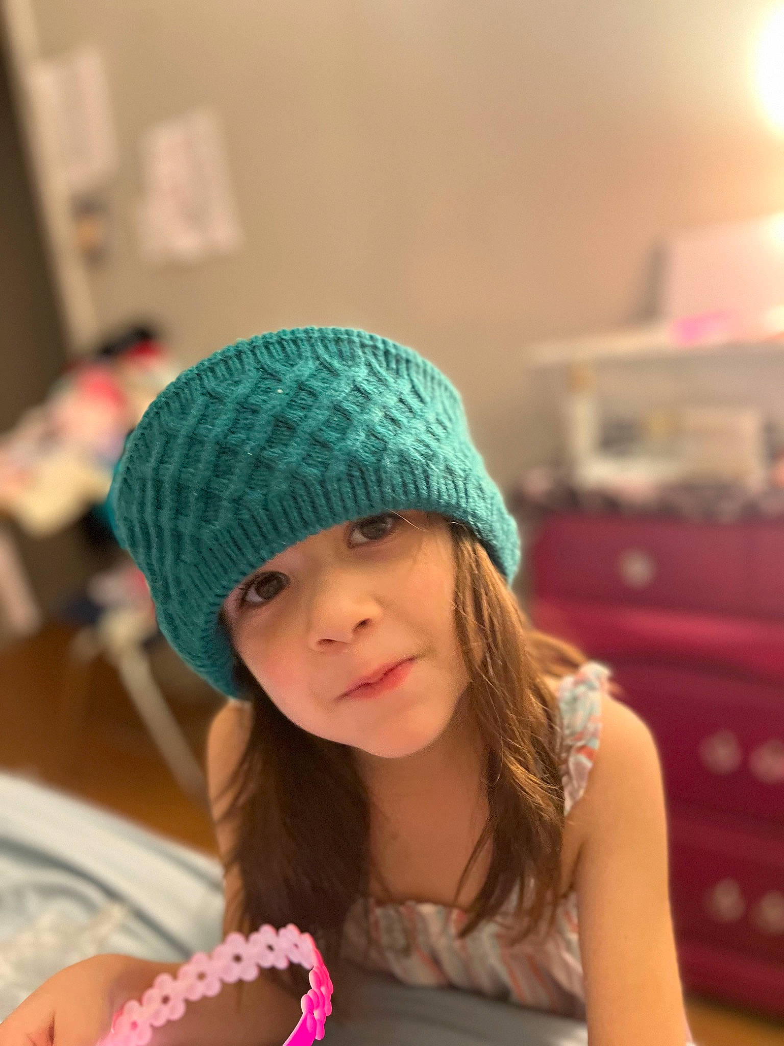 Jazmyn joined the competition — help win amazing prizes! beanie, cap, child, electric_blue, fashion_accessory, fun, hair_accessory, happy, headgear, headwear, jewellery, knit_cap, leisure, magenta, nail, pattern, person, portrait_photography, recreation, sitting