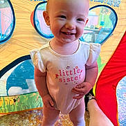 Sophia joined the competition — help win amazing prizes! toddler, child, smiling, indoor, play_tent, onesie, little_sister, happy, standing, carpet, colorful, cute, baby, person, portrait, feet, playtime, fun, bright, casual