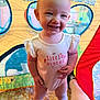 toddler, child, smiling, indoor, play_tent, onesie, little_sister, happy, standing, carpet, colorful, cute, baby, person, portrait, feet, playtime, fun, bright, casual