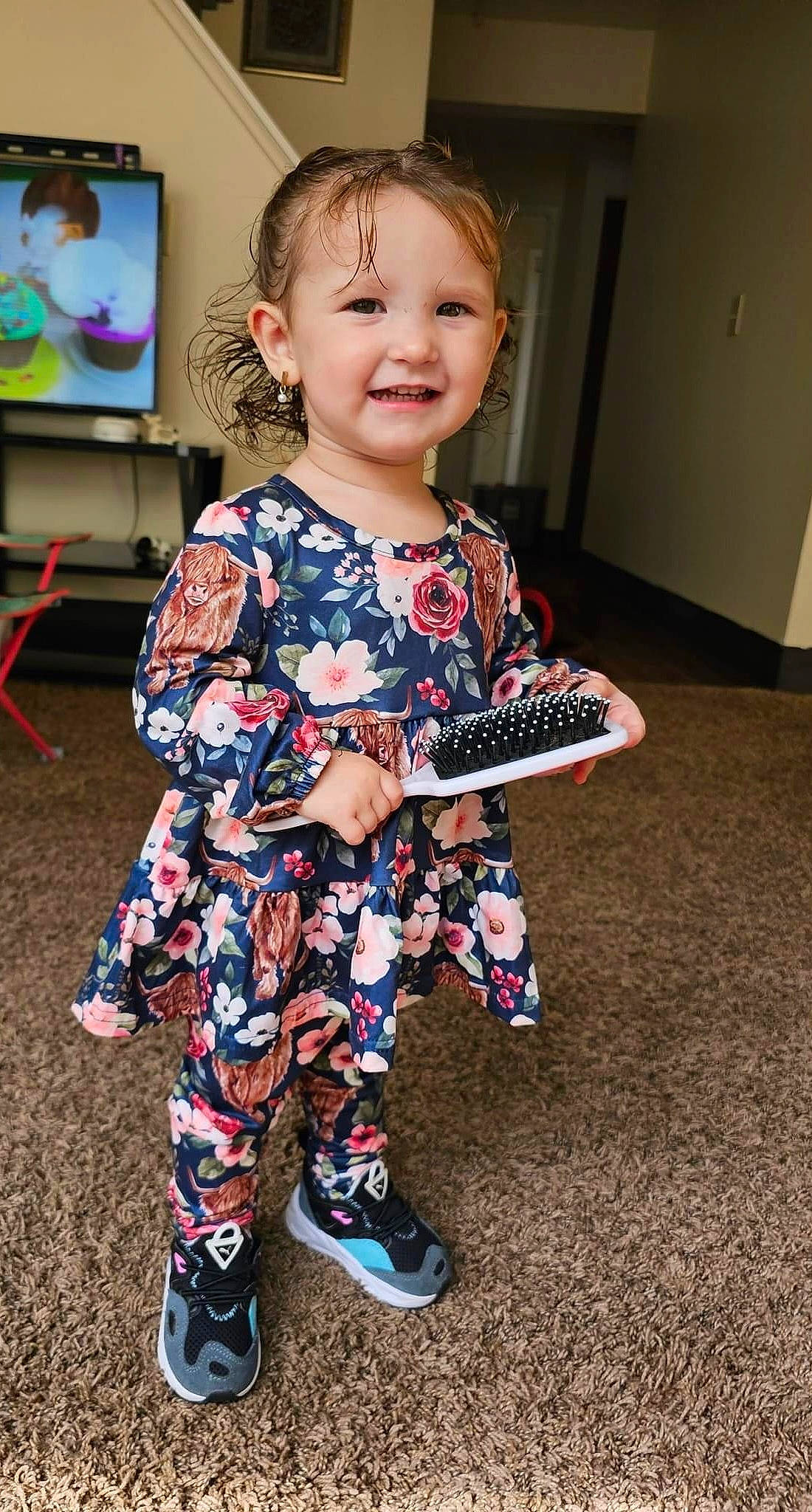 Amayah is registered to the contest to win money with this photo: baby_toddler_clothing, child, electric_blue, event, facial_expression, fashion_design, flooring, fun, hairstyle, happy, joy, pattern, person, picture_frame, play, sitting, sleeve, smile, t_shirt, television