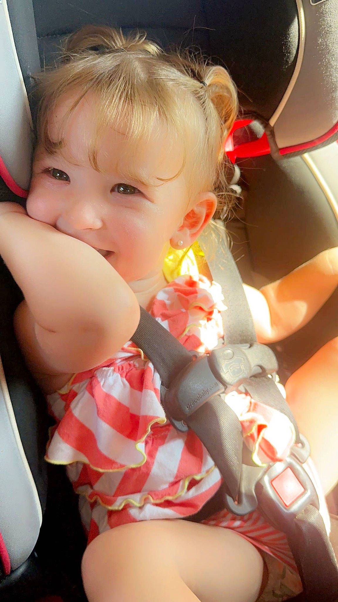 Amayah joined the competition — help win amazing prizes! baby, baby_toddler_clothing, car_seat, cheek, dress, eye, finger, gesture, hairstyle, head, human_body, leg, lip, mouth, nail, nose, person, skin, thigh, thumb