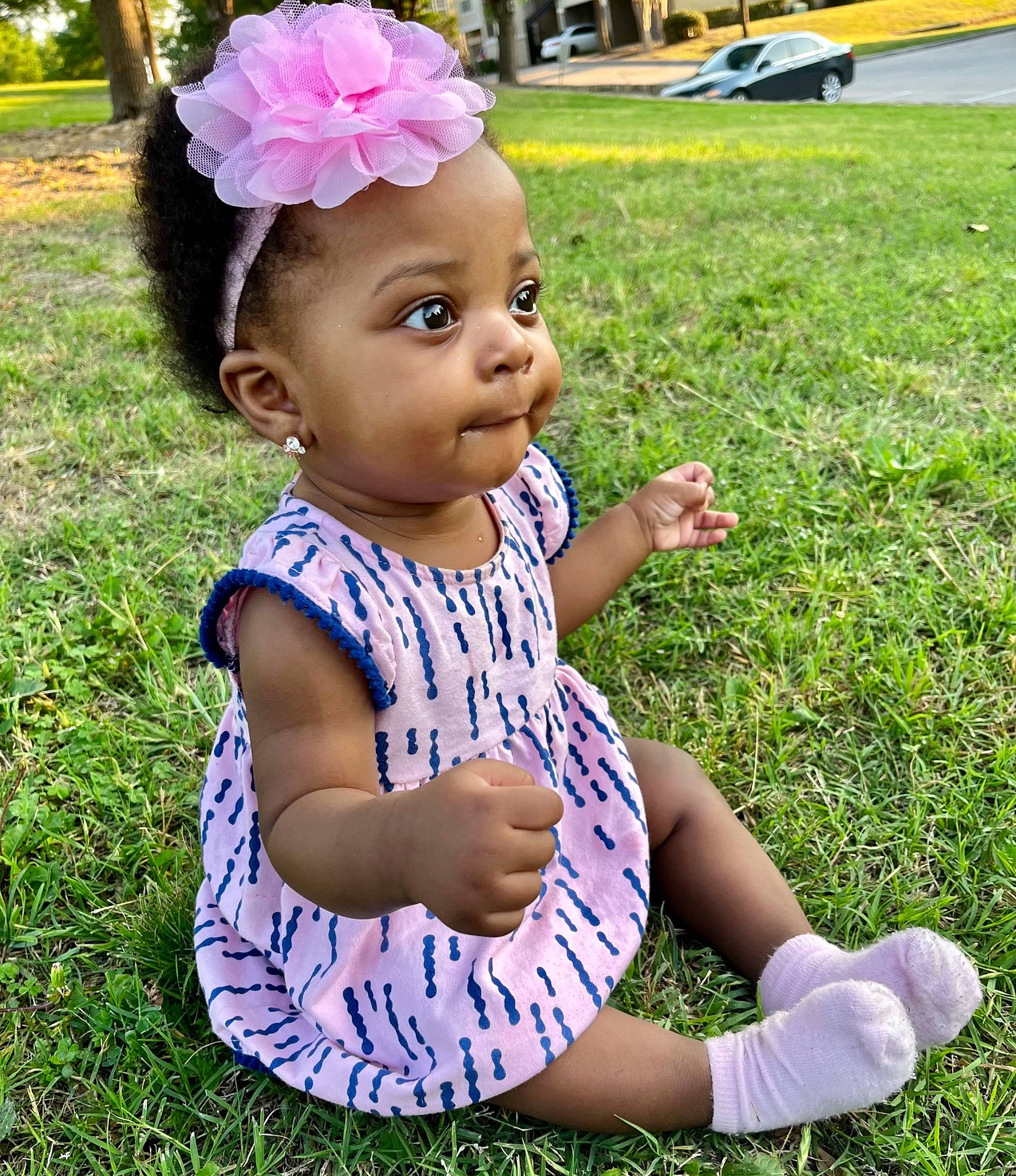 Ava-marie is registered to the contest to win money with this photo: baby, baby_toddler_clothing, child, eye, fun, grass, grass_family, green, happy, lawn, meadow, people_in_nature, person, photograph, pink, plant, sleeve, smile, summer, toddler