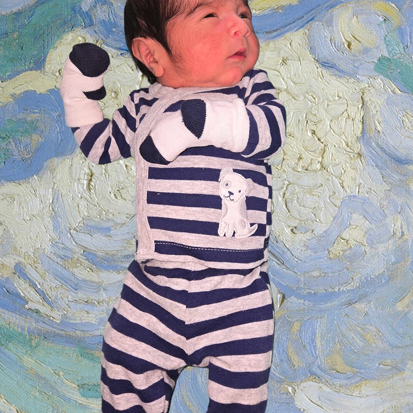 Jaden is registered to the contest to win money with this photo: baby, bed, blanket, bodypart, clothing, face, finger, glove, hand, head, longsleeve, newborn, pajamas, pants, person, photography, portrait, sleeping, sleeve, standing