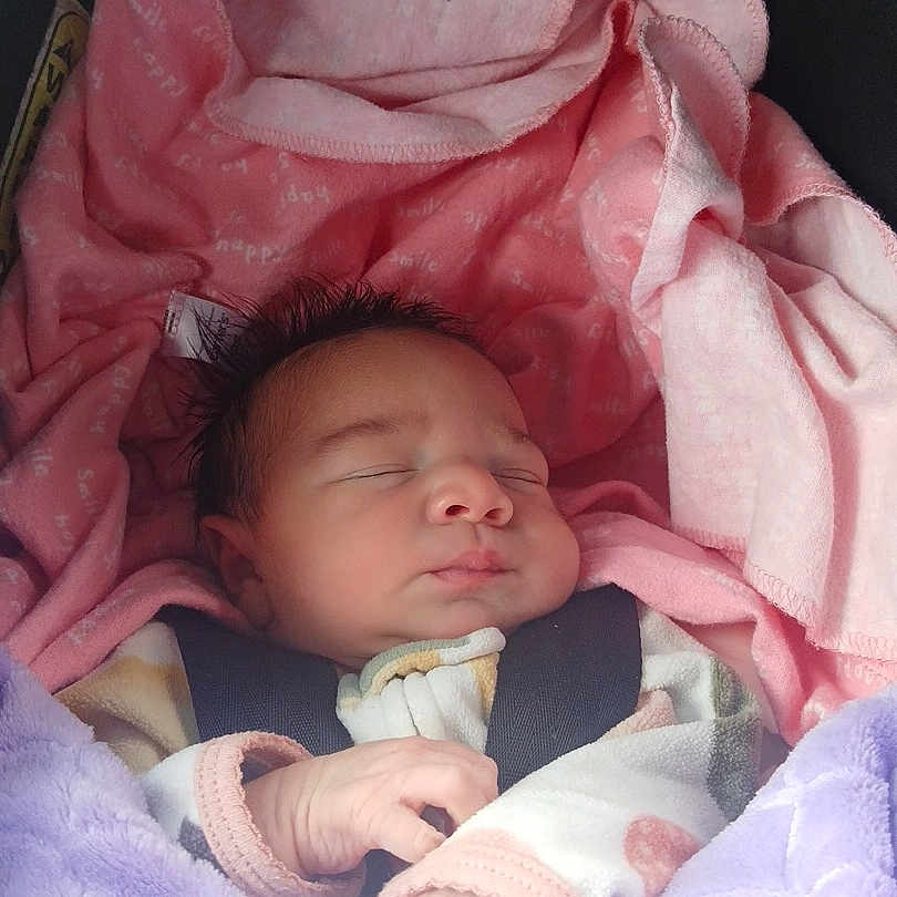 Infinitee is registered to the contest to win money with this photo: baby, sleeping, blanket, pink, purple, infant, cozy, hands, peaceful, cute, newborn, soft, resting, warm, portrait, child, closeup, indoors, sleep, bundle