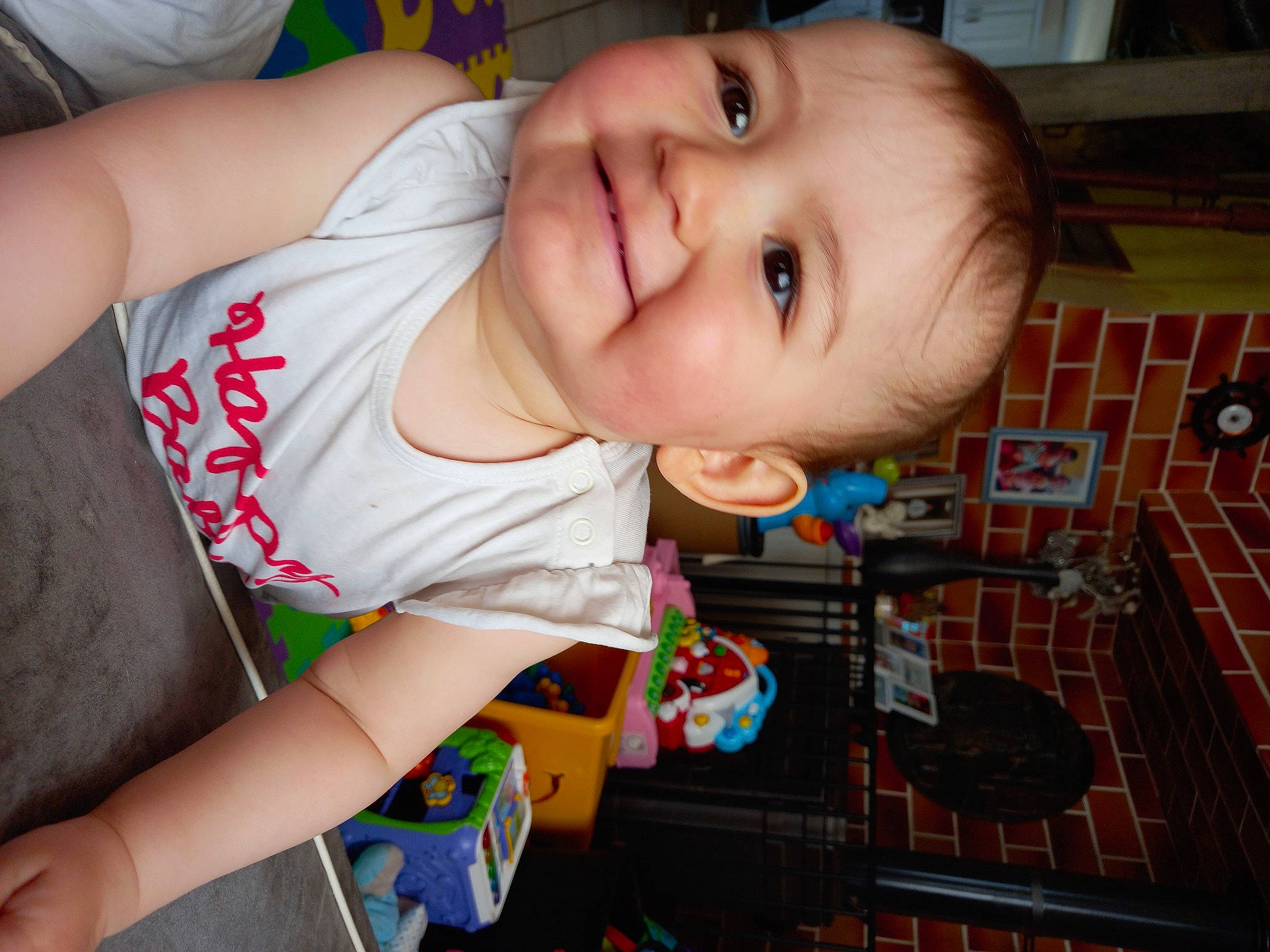 Maeva a rejoint le concours — aidez-le/la à gagner de superbes lots ! baby, baby_products, baby_toddler_clothing, cheek, child, elbow, eye, flooring, fun, happy, head, iris, joy, lip, mouth, nose, organ, person, skin, smile