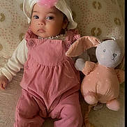 Julia participe au concours pour gagner de l'argent avec cette photo : baby, infant, child, hat, flower_hat, pink_overalls, socks, soft_toy, stuffed_bunny, blanket, pillow, bed, nursery, teething_ring, portrait, cute, wide_eyes, rosy_cheeks, soft_lighting, lying_down