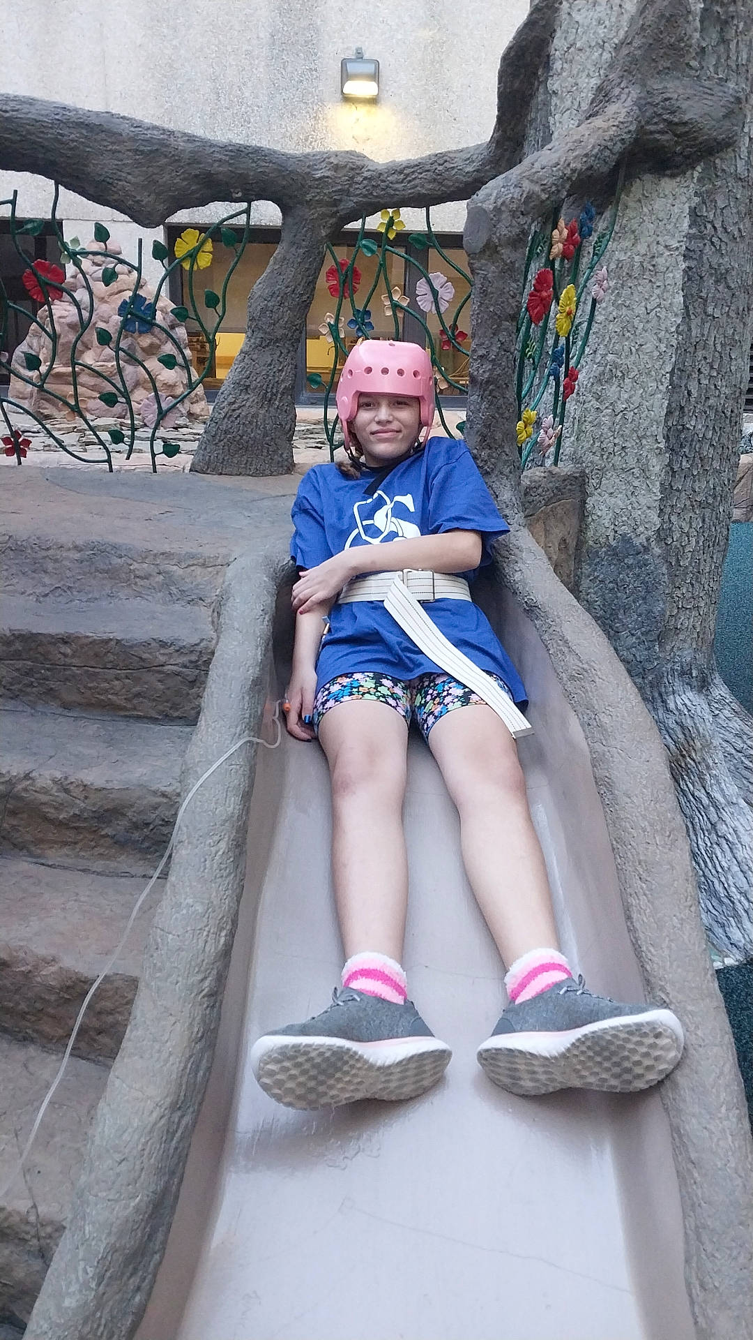 Sarah is registered to the contest to win money with this photo: azure, city, cool, electric_blue, eyewear, footwear, fun, headwear, human_leg, joy, leisure, person, photograph, recreation, shoe, shorts, sitting, sneakers, thigh, tourism