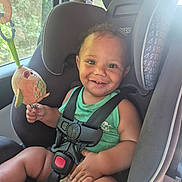 Kayden joined the competition — help win amazing prizes! child, toddler, car_seat, smile, toy, plush_toy, car_interior, seatbelt, window, sunlight, greenery, happy, sitting, infant, clothing, safety, baby, cute, indoors, portrait