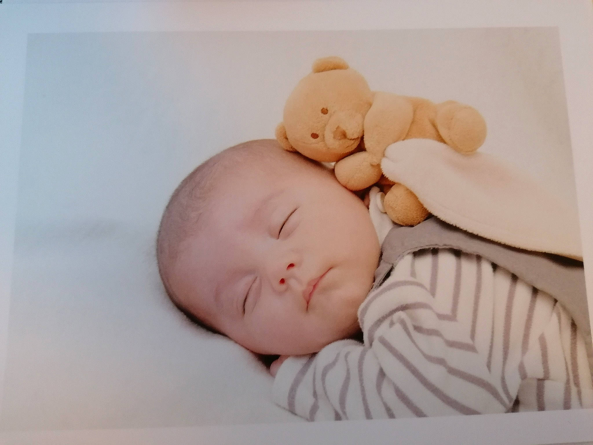 Sohan participe au concours pour gagner de l'argent avec cette photo : art, baby, baby_sleeping, baby_toddler_clothing, bedtime, cheek, child, comfort, ear, fur, happy, linens, nap, person, portrait_photography, room, sitting, sleep, toddler