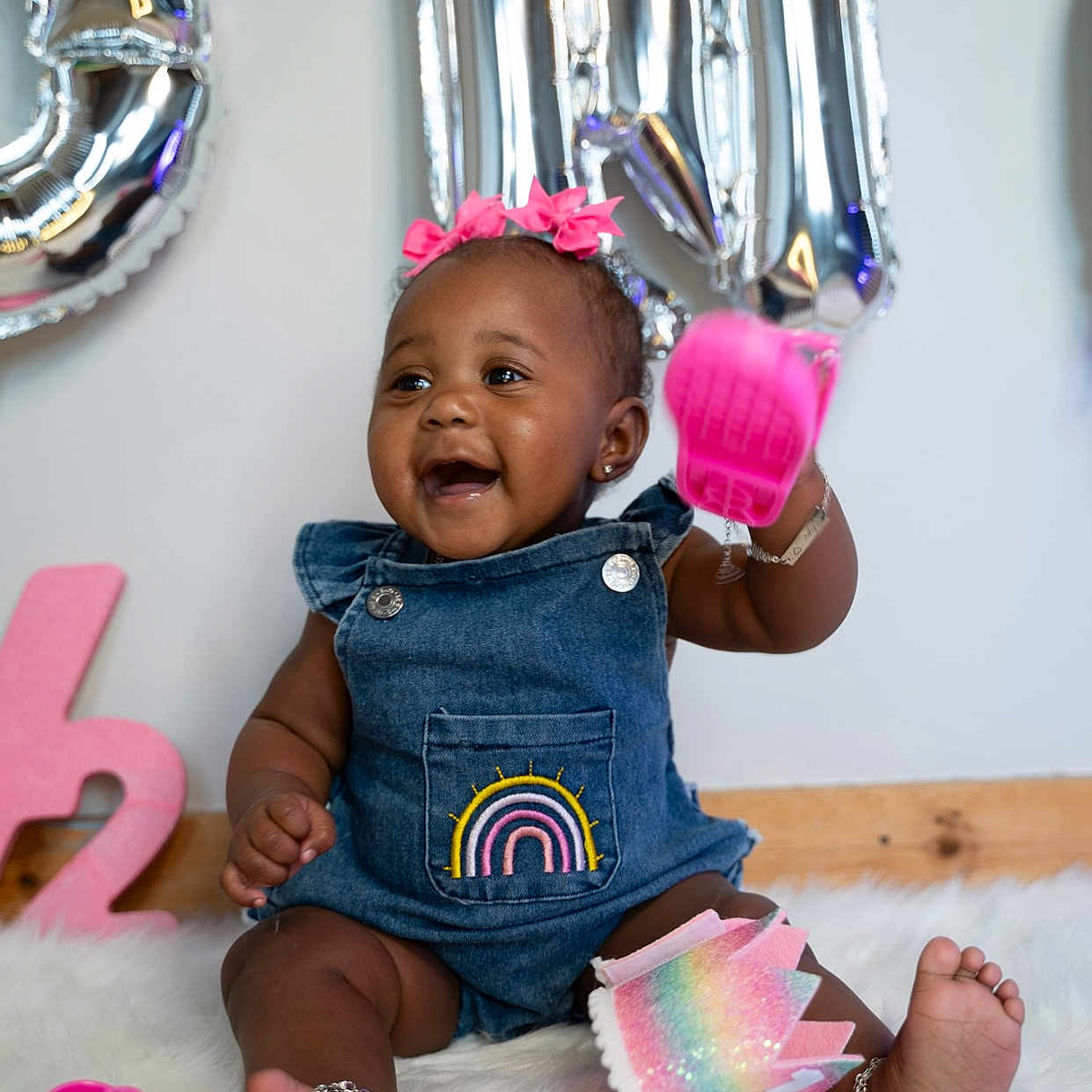 Lyric is registered to the contest to win money with this photo: accessories, baby, bodypart, clothing, cream, dessert, face, finger, food, glove, hand, hat, head, icing, jeans, pants, people, person, photography, portrait