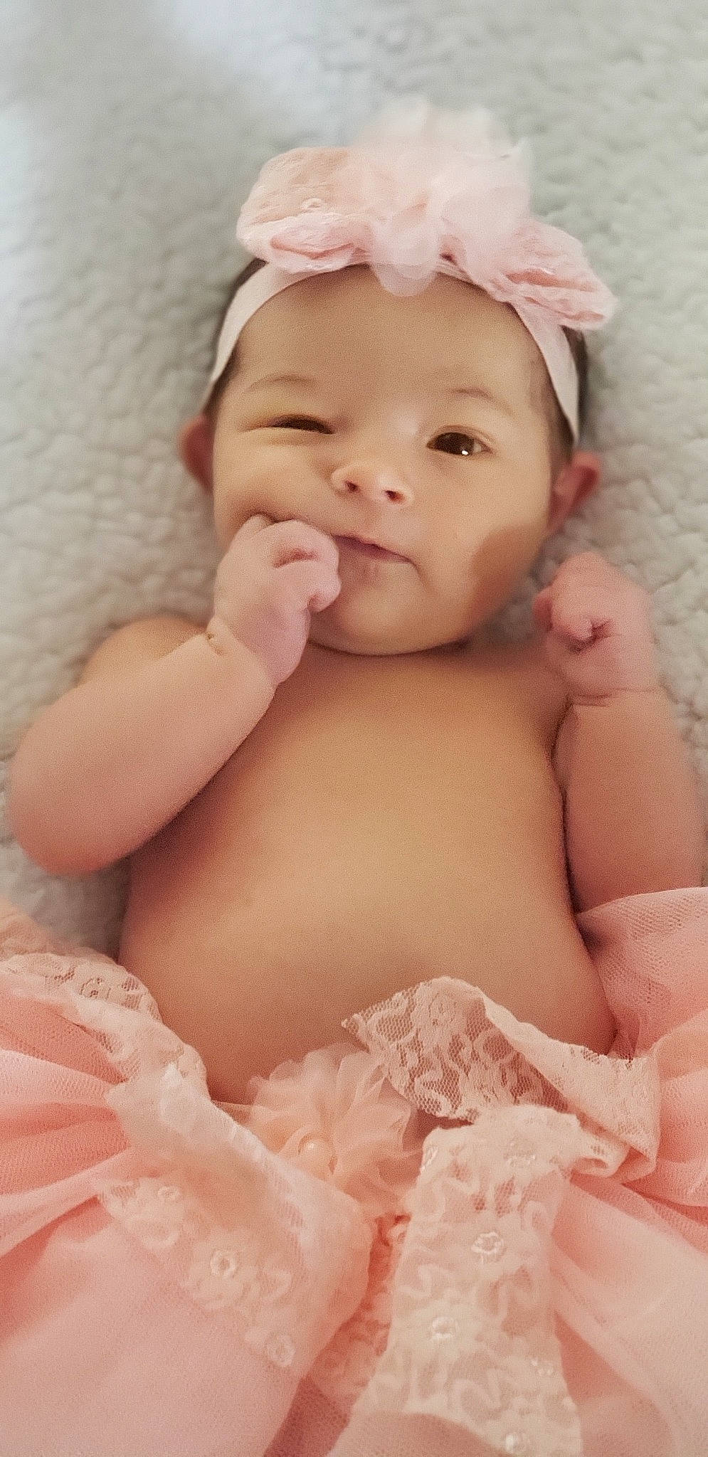 Evalynn is registered to the contest to win money with this photo: baby, beauty, cheek, child, eye, headwear, mouth, person, pink, skin, stomach, toddler