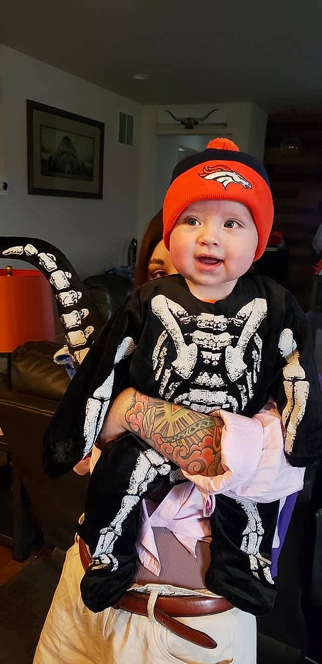 Desmond joined the competition — help win amazing prizes! baby, baby_toddler_clothing, cap, chair, child, costume, event, fashion_accessory, fashion_design, fun, happy, headgear, headwear, jewellery, person, personal_protective_equipment, picture_frame, sleeve, smile, street_fashion