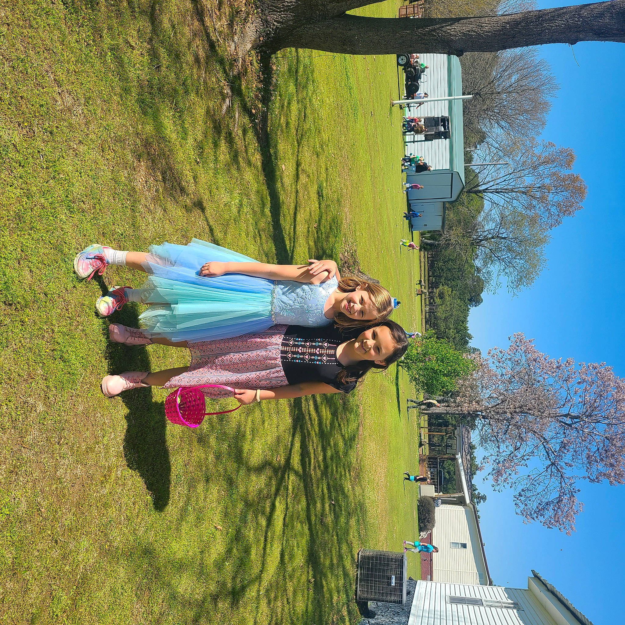 Leah is registered to the contest to win money with this photo: grass, green, joy, landscape, leisure, people_in_nature, person, plant, pole, reflection, sky, street_light, travel, tree, trunk, wood