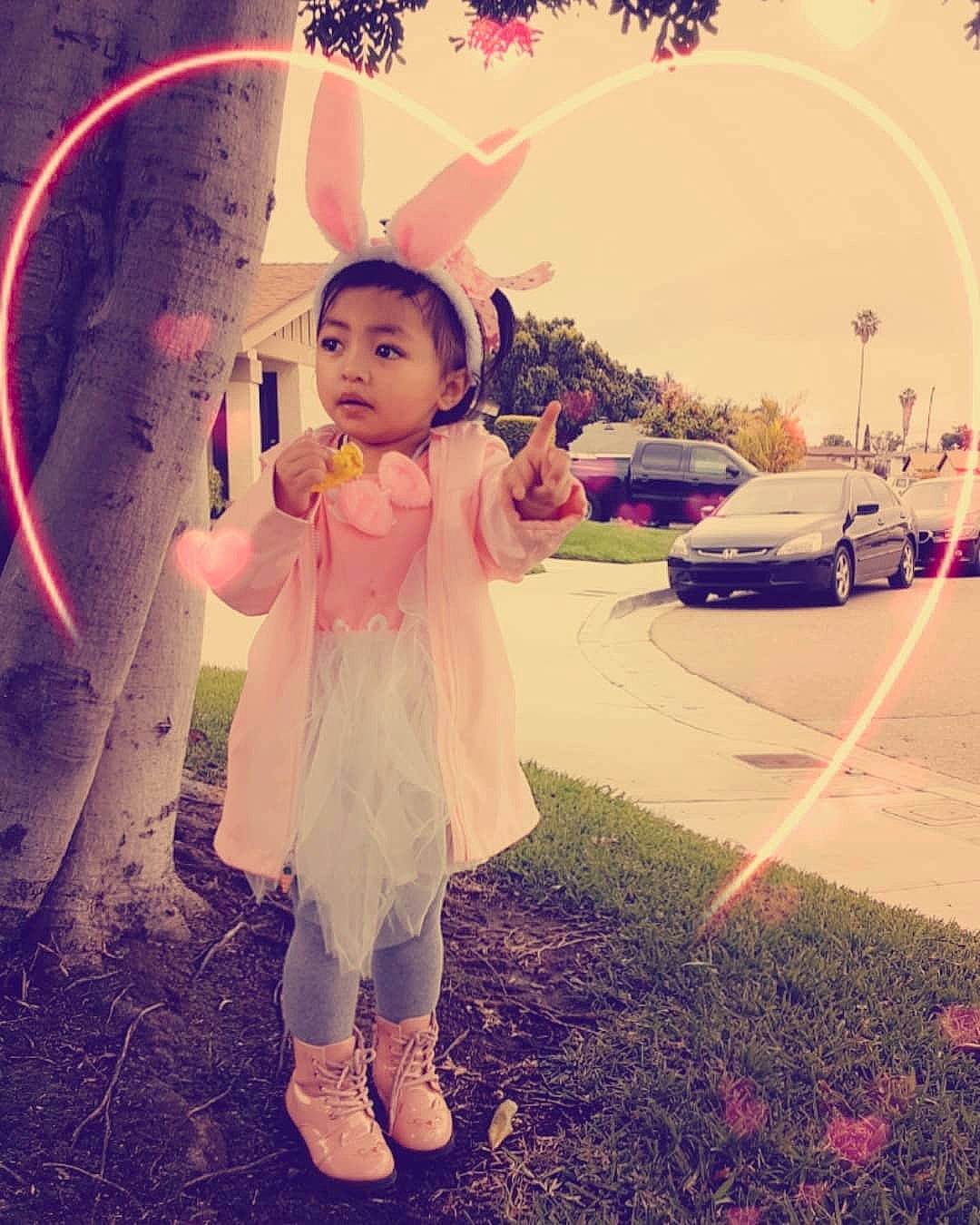 Nikole is registered to the contest to win money with this photo: baby, child, dress, fashion_accessory, flower, fun, happy, person, photography, pink, plant, play, sky, smile, tints_and_shades, toddler, yellow