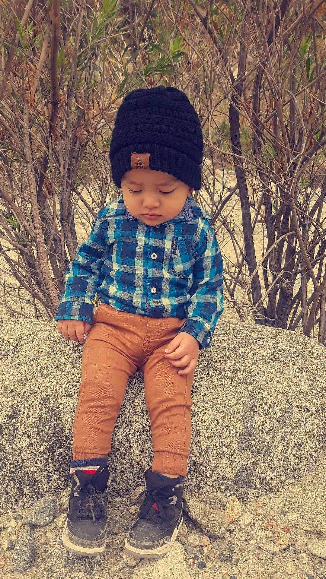 Melvyn joined the competition — help win amazing prizes! beanie, bonnet, cap, child, clothing, cool, design, footwear, hat, headgear, headwear, jacket, jeans, knit_cap, outerwear, pattern, person, shoe, toddler, tree