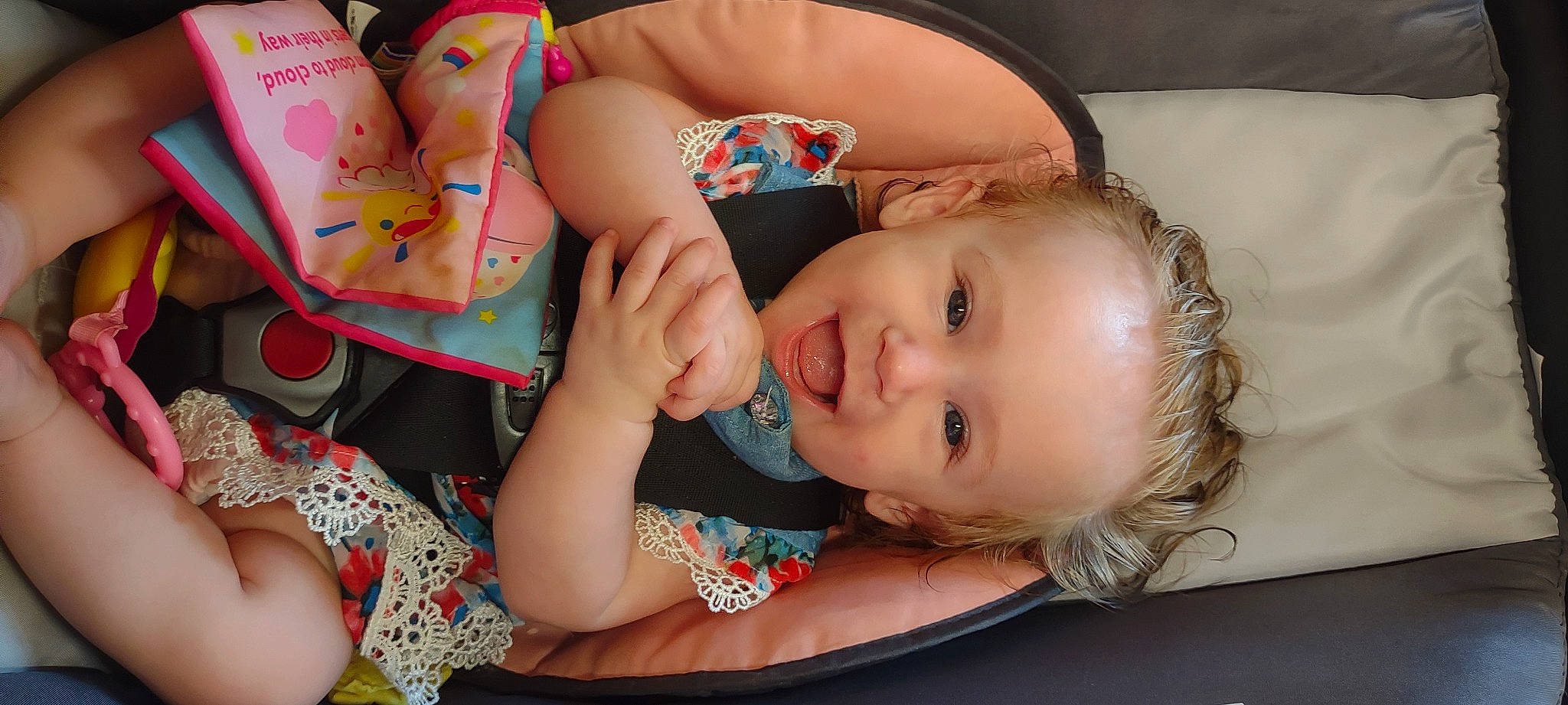 Haisley joined the competition — help win amazing prizes! baby_toddler_clothing, blond, cheek, child, eye, face, fun, happy, human_leg, iris, lip, mouth, neck, person, pink, sitting, skin, smile, textile, thigh
