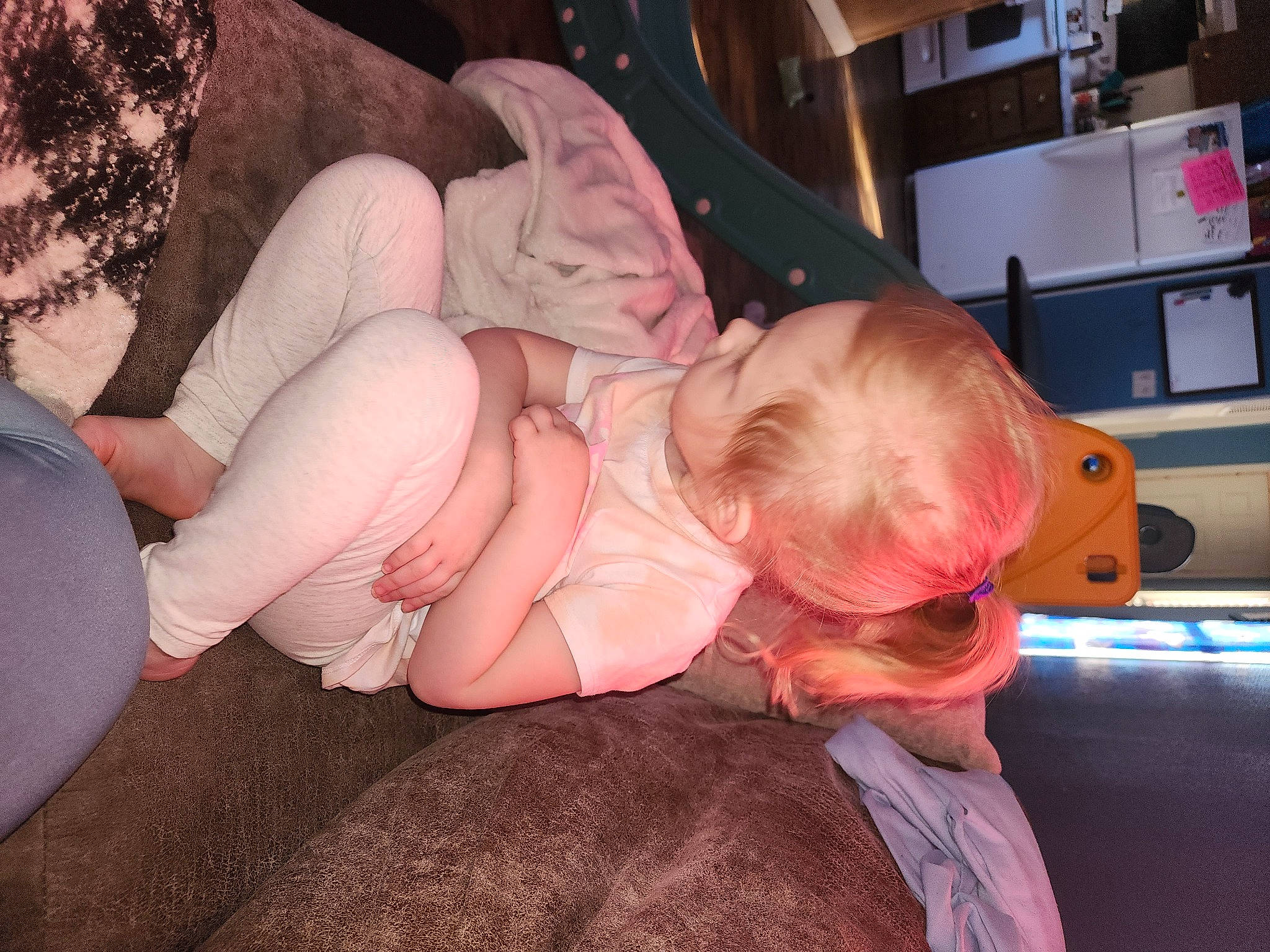 Addison is registered to the contest to win money with this photo: abdomen, baby, chest, child, comfort, elbow, event, flesh, fun, happy, human_leg, knee, lap, mouth, person, shorts, sitting, thigh, thumb, toddler