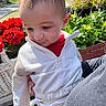 toddler, child, baby, outdoor, flowers, red_flowers, yellow_flowers, greenery, sunlight, white_outfit, zipper, person, cute, portrait, nature, garden, hand, face, head, casual_clothing