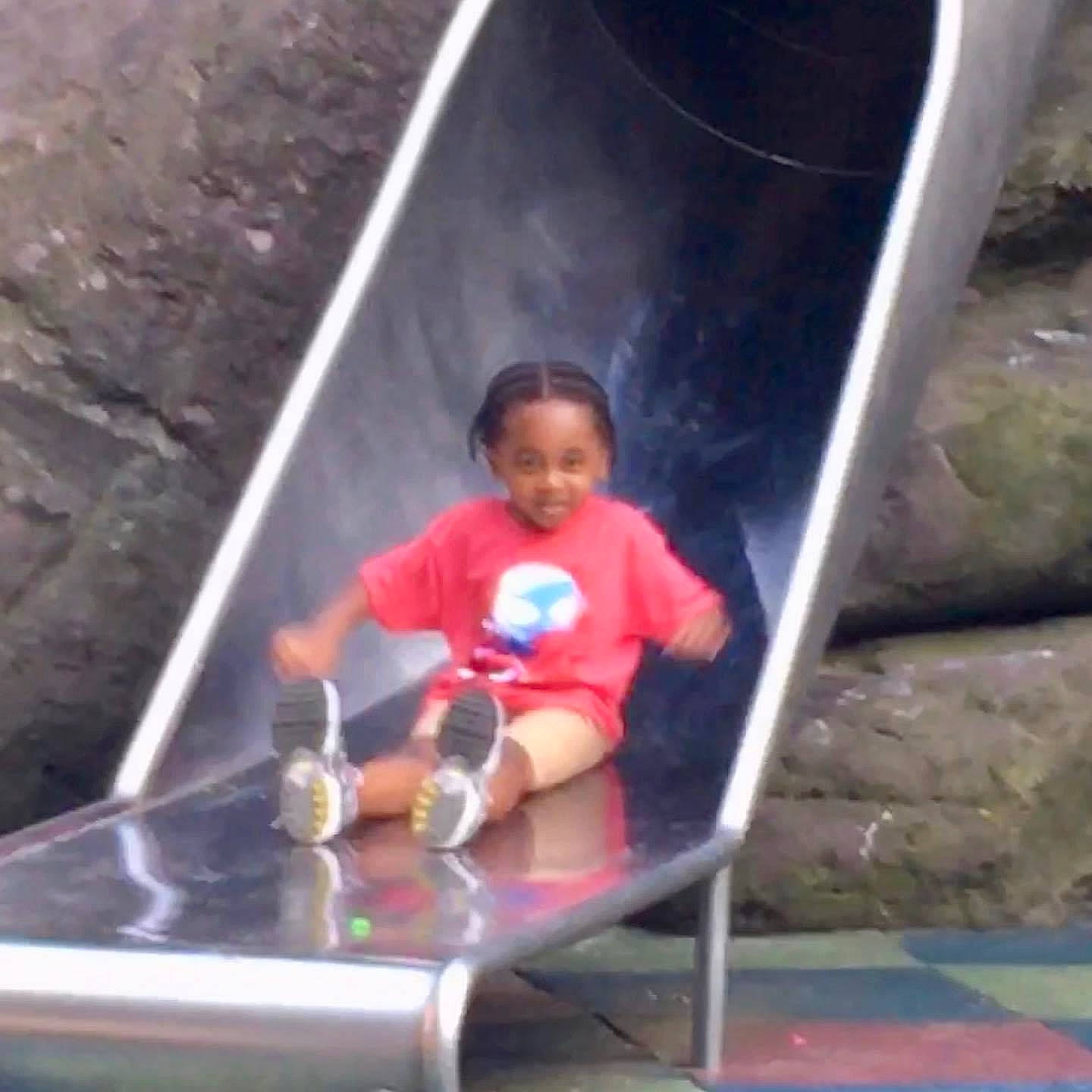 Quamieke Kotto Harris is registered to the contest to win money with this photo: blurred, child, fun, glass, leisure, person, recreation, shorts, sitting, smile, t_shirt, table, thigh, toddler, vacation, vehicle_door, water, world