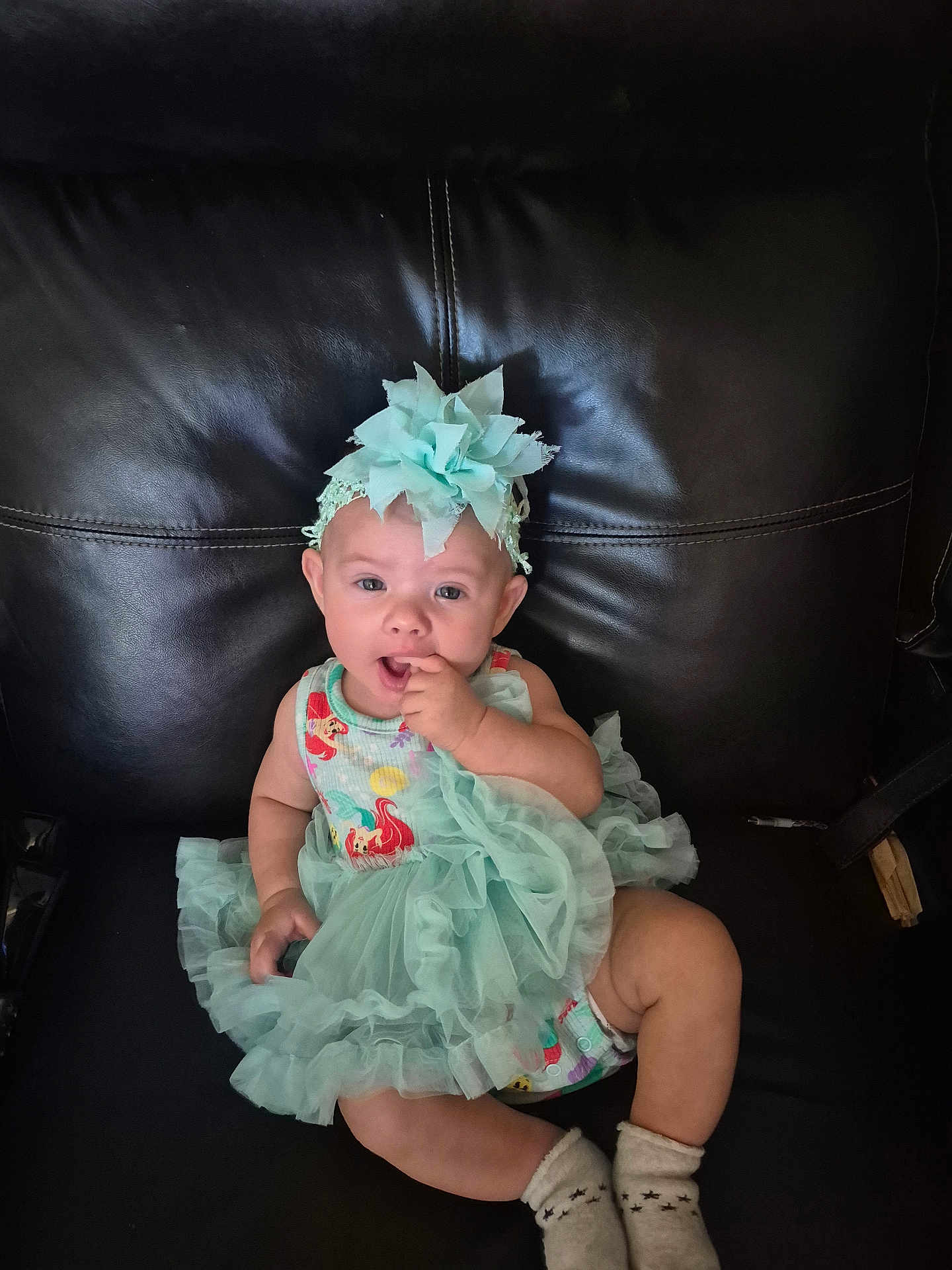 Serenity Norton is registered to the contest to win money with this photo: baby, child, dress, headband, sitting, couch, leather, cute, infant, sock, adorable, portrait, indoor, clothing, person, smiling, young, fashion, happy, toddler