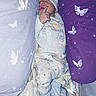 baby, bed, bedding, bedroom, blanket, butterflies, cozy, cute, face, fantasy, hat, indoors, infant, pajamas, peaceful, portrait, resting, sleeping, soft_lighting, sparkles