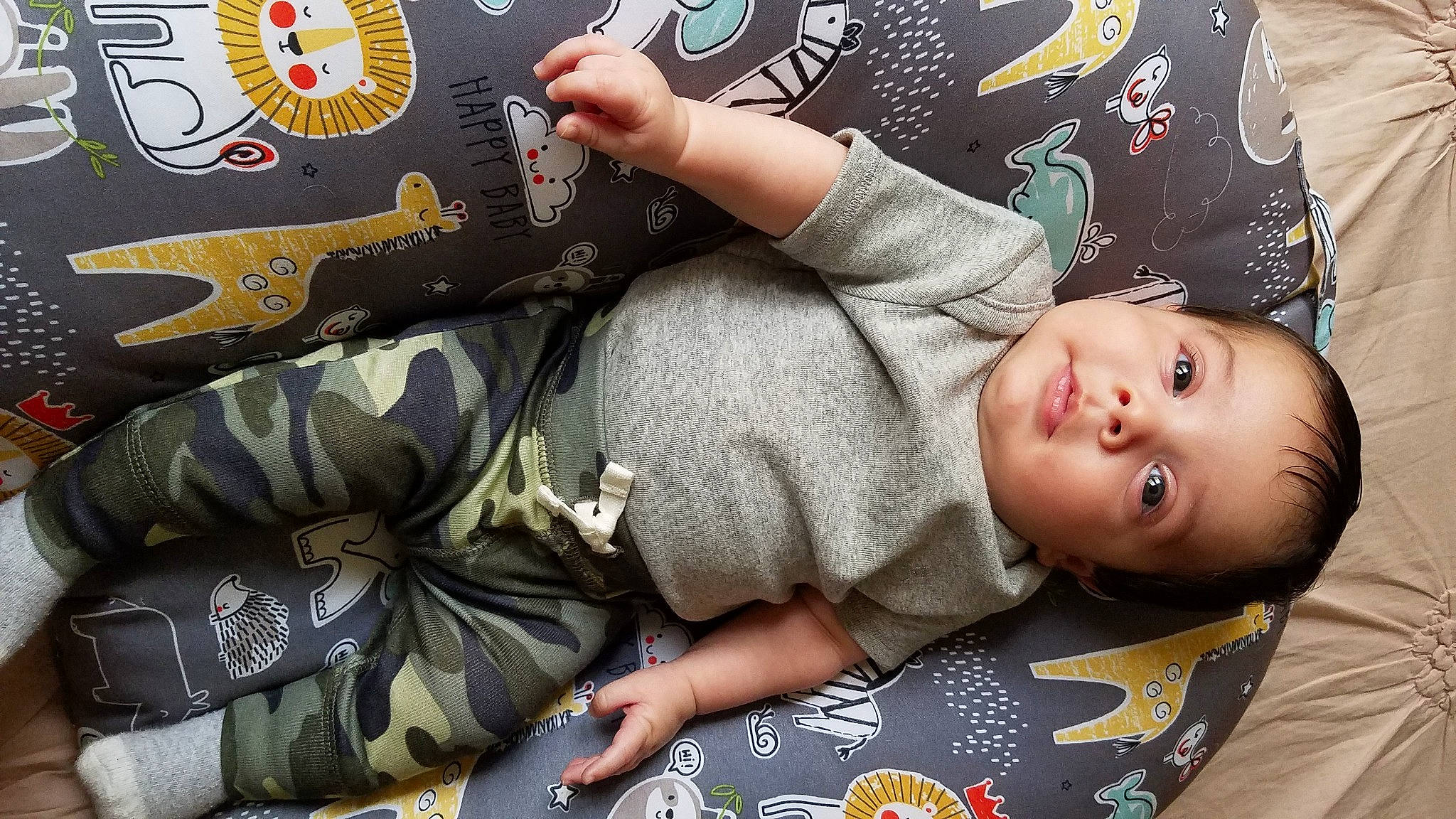 Jeffrey joined the competition — help win amazing prizes! arm, baby, baby_toddler_clothing, child, comfort, cool, couch, elbow, finger, gesture, hand, head, human_body, linens, pattern, person, product, sitting, skin, sleeve