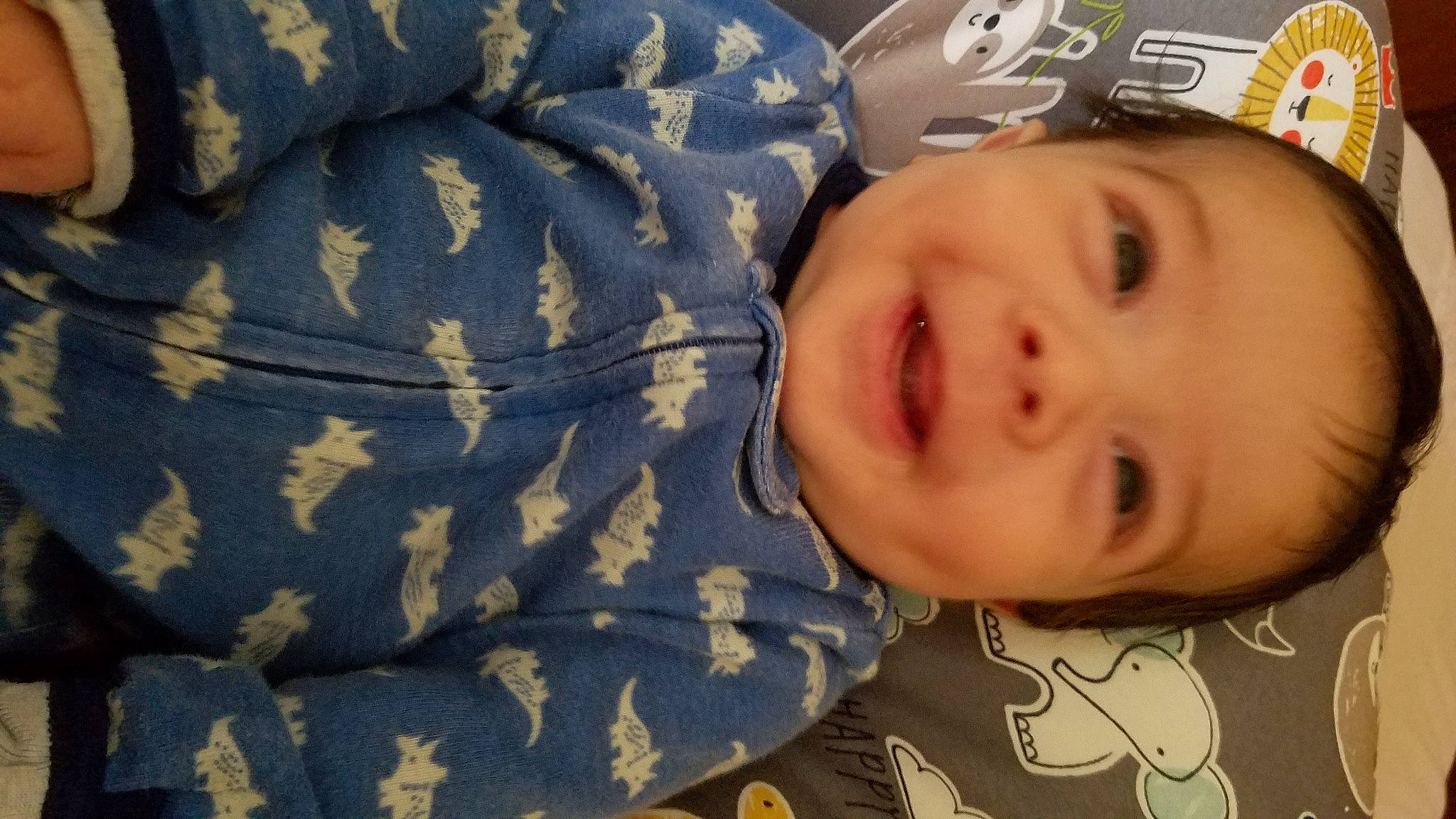 Jeffrey is registered to the contest to win money with this photo: baby, baby_laughing, baby_toddler_clothing, cheek, child, chin, comfort, eyebrow, eyelash, happy, iris, lip, military_camouflage, nose, pattern, people, person, skin, sleeve, smile
