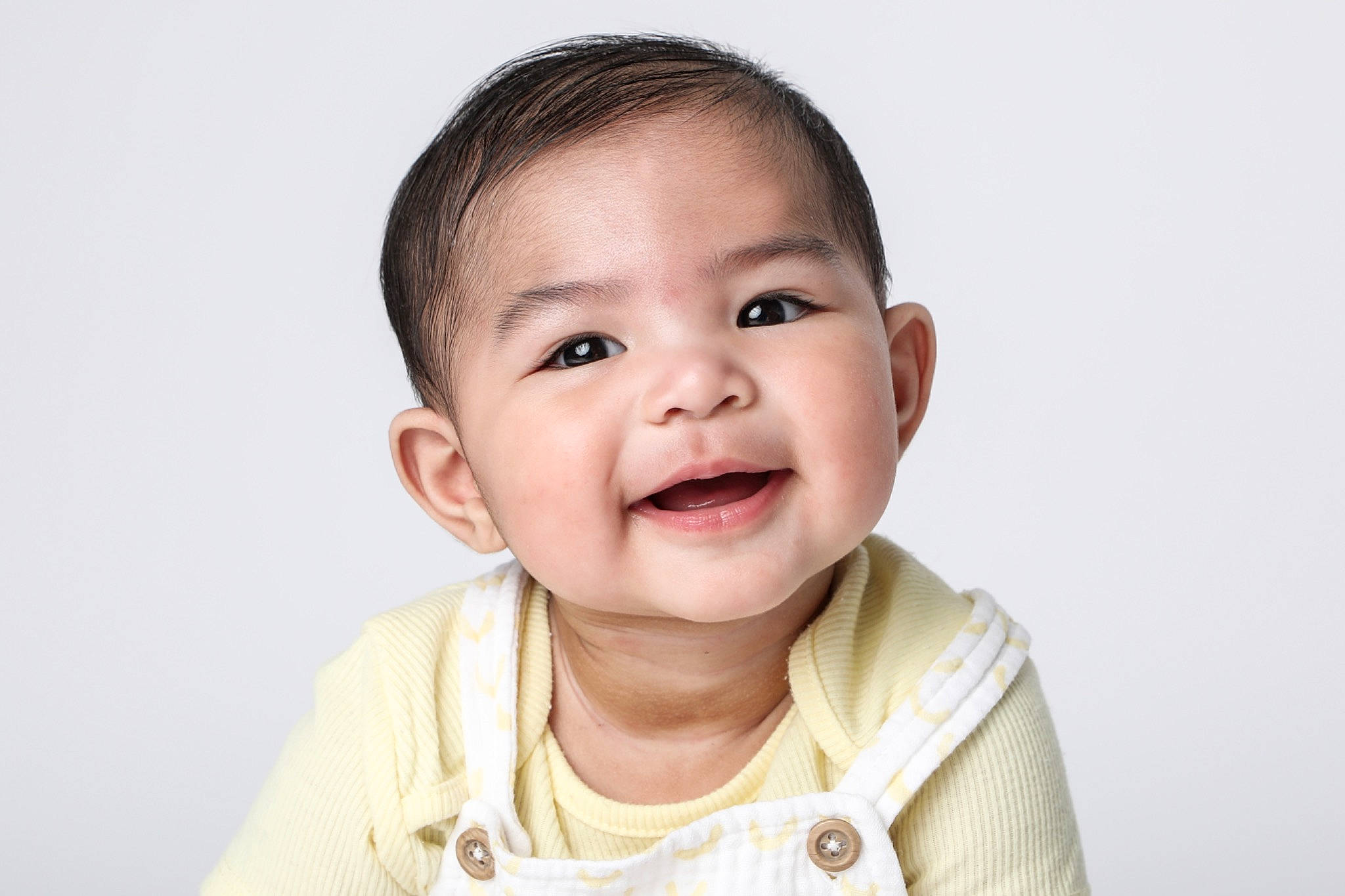 Amaya is registered to the contest to win money with this photo: baby, baby_toddler_clothing, cheek, chin, collar, ear, eyebrow, eyelash, face, finger, gesture, happy, iris, joy, lip, neck, nose, person, skin, sleeve