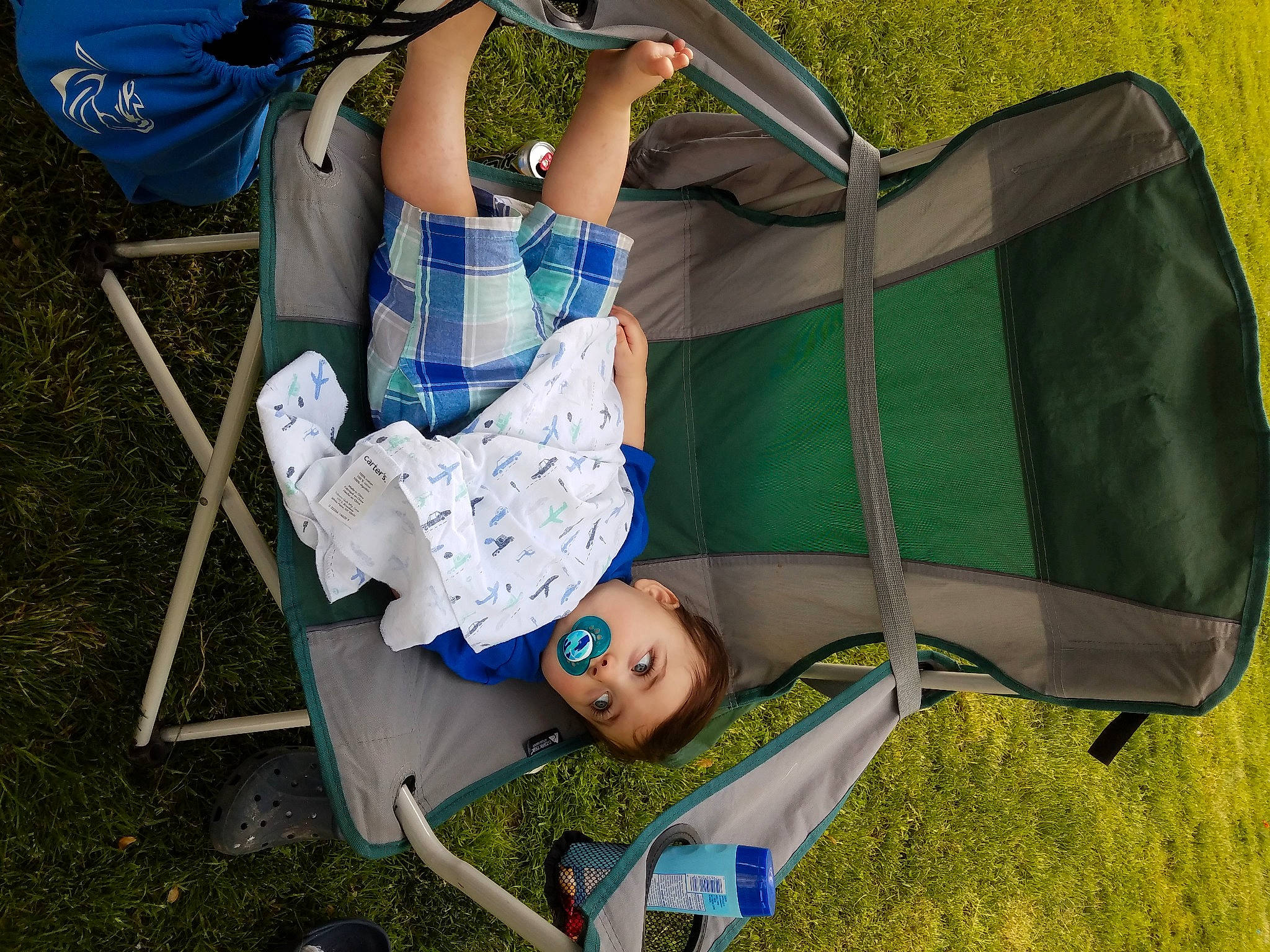 Jagger joined the competition — help win amazing prizes! baby_carriage, bag, baggage, camping, child, grass, leisure, luggage_and_bags, person, product, recreation, tent, vacation