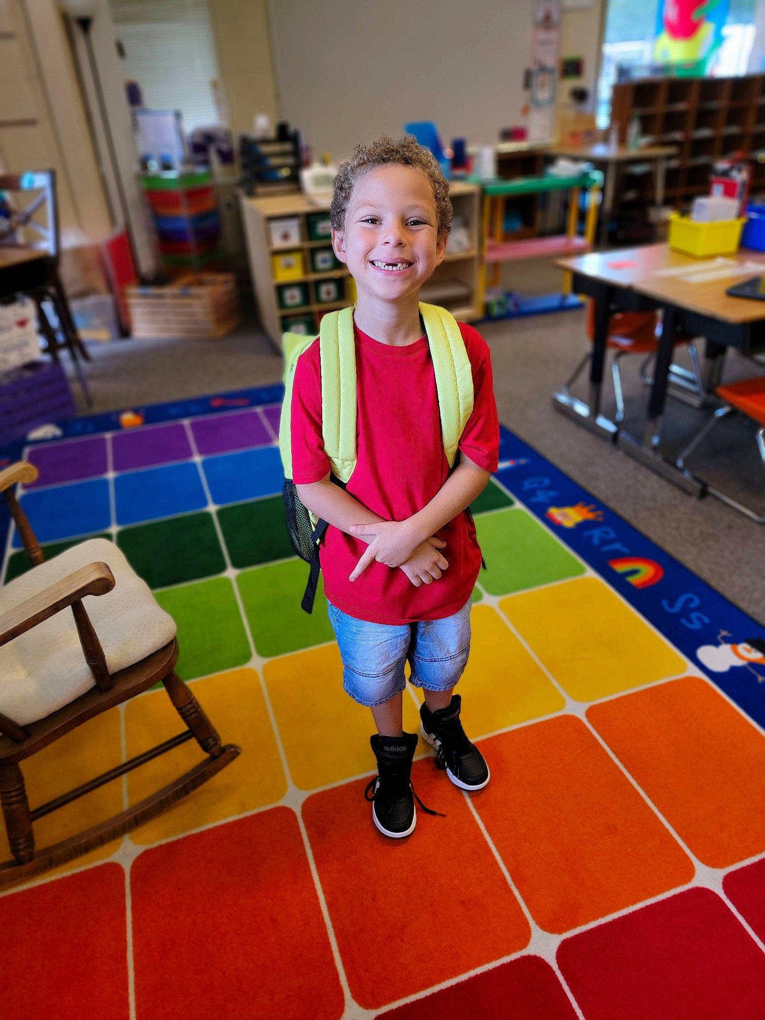 Camron joined the competition — help win amazing prizes! chair, child, design, event, floor, flooring, fun, furniture, hardwood, indoor_games_and_sports, joy, kindergarten, leisure, pattern, person, play, recreation, room, smile, table